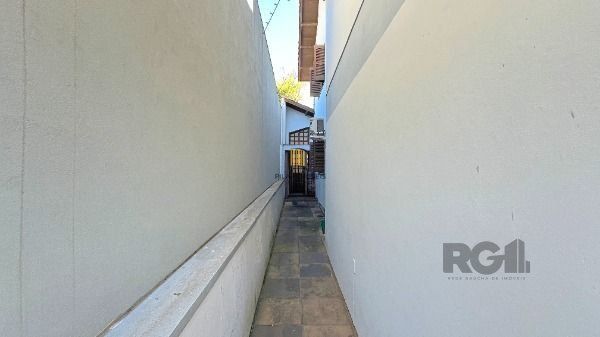 Casa 4 dormitórios no bairro Camaquã