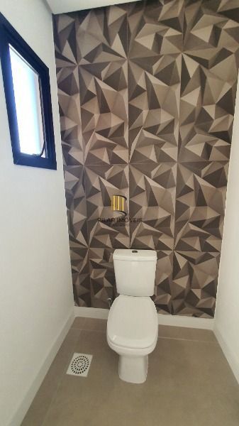 Casa Condominio em Porto Alegre, no bairro Ipanema, com 3 dormitório(s), e 3 banheiros, à venda.