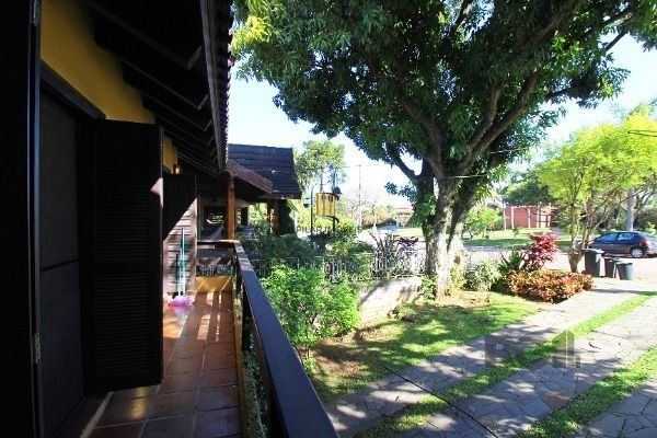 Casa Condominio em Porto Alegre, no bairro Cavalhada, com 4 dormitório(s), e 4 banheiros, à venda.