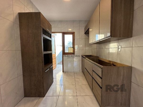 Casa Condominio em Porto Alegre, no bairro Ponta Grossa, com 2 dormitório(s), e 2 banheiros, à venda.