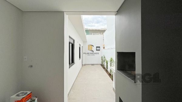 Casa em Porto Alegre, no bairro Hípica, com 3 dormitório(s), e 3 banheiros, à venda.