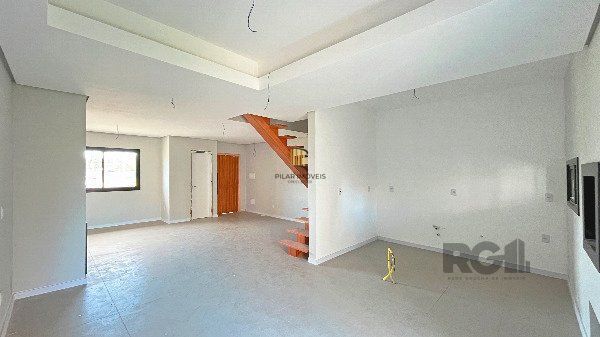 Casa em Porto Alegre, no bairro Hípica, com 3 dormitório(s), e 3 banheiros, à venda.