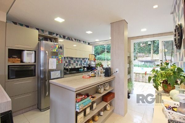 Casa Condominio em Porto Alegre, no bairro Sétimo Céu, com 4 dormitório(s), e 4 banheiros, à venda.