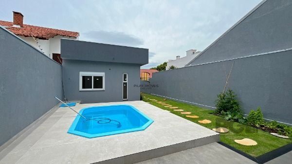 Casa em Porto Alegre, no bairro Ipanema, com 3 dormitório(s), à venda.