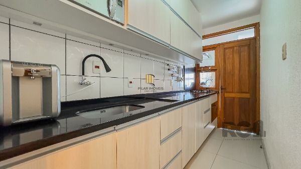 Casa 3 dormitórios no bairro Hípica