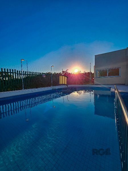 Casa Condominio em Porto Alegre, no bairro Hípica, com 3 dormitório(s), e 3 banheiros, à venda.