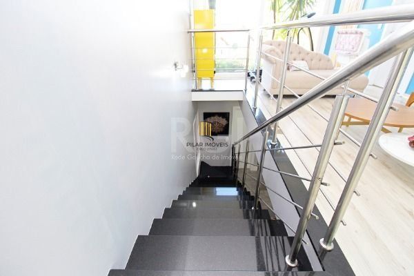 Casa Condominio em Porto Alegre, no bairro Hípica, com 3 dormitório(s), e 3 banheiros, à venda.