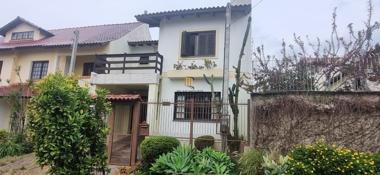 Ótima residência com 3 dormitórios, sendo 1 suíte, lareira e piscina.