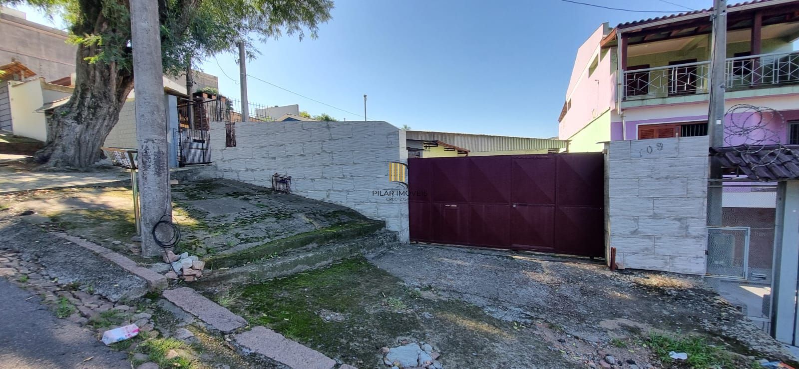 Casa com pavilhão