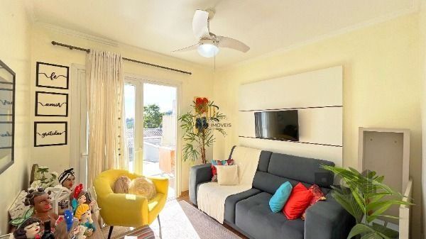 Casa Condominio em Porto Alegre, no bairro Vila Nova, com 3 dormitório(s), e 3 banheiros, à venda.