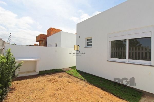 Casa Condominio em Porto Alegre, no bairro Hípica, com 3 dormitório(s), e 3 banheiros, à venda.
