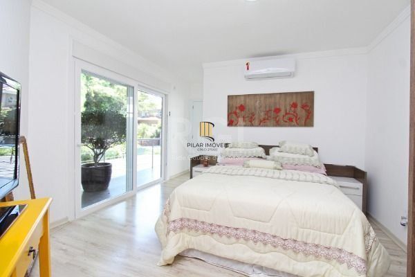 Casa Condominio em Porto Alegre, no bairro Hípica, com 3 dormitório(s), e 3 banheiros, à venda.