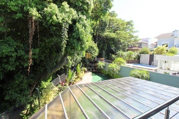 Casa Condominio em Porto Alegre, no bairro Hípica, com 3 dormitório(s), e 3 banheiros, à venda.