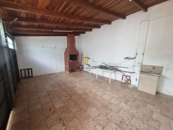 Casa 4 dormitórios no bairro Camaquã