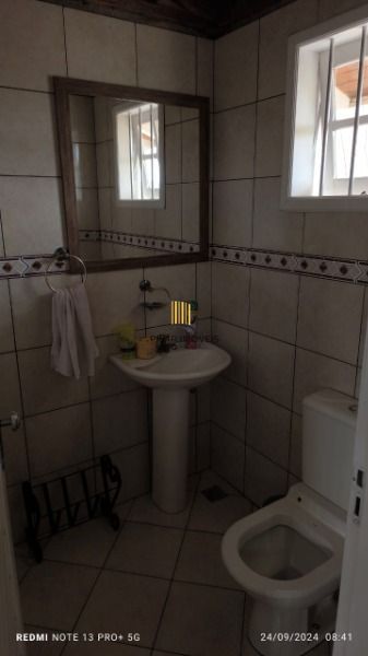 Casa em Porto Alegre, no bairro Hípica, com 3 dormitório(s), e 3 banheiros, à venda.
