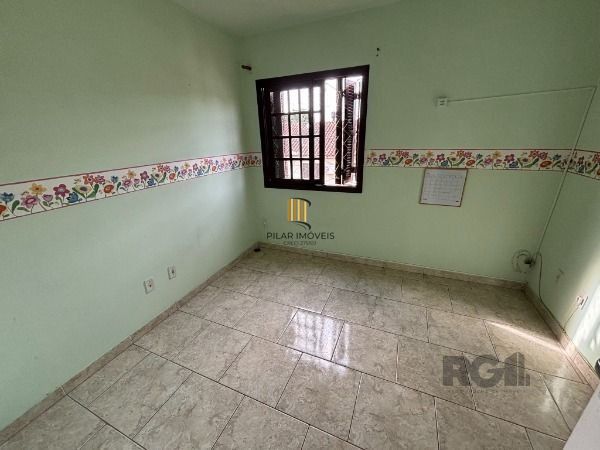 Casa Condominio em Porto Alegre, no bairro Vila Nova, com 3 dormitório(s), à venda.