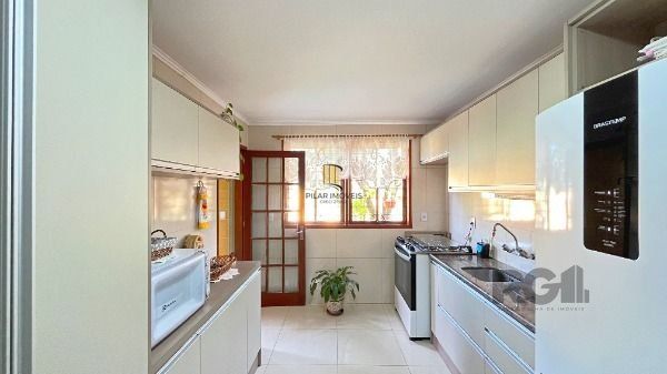 Casa 3 dormitórios no bairro Hípica