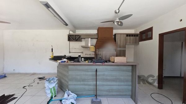 Casa 3 dormitórios no bairro Camaquã