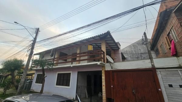 Casa em Porto Alegre, no bairro Hípica, à venda. - Pilar Imóveis