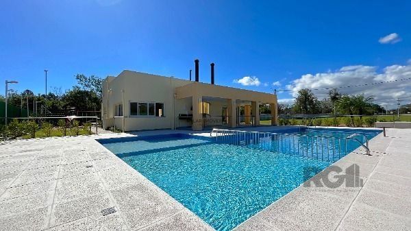 Casa Condominio em Porto Alegre, no bairro Hípica, com 3 dormitório(s), e 3 banheiros, à venda.
