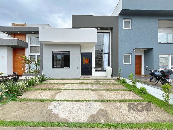 Casa Condominio em Porto Alegre, no bairro Hípica, com 3 dormitório(s), à venda. - Pilar Imóveis