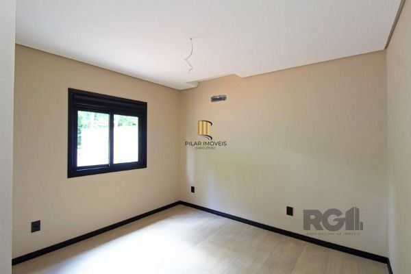 Casa em Porto Alegre, no bairro Hípica, com 3 dormitório(s), e 3 banheiros, à venda.
