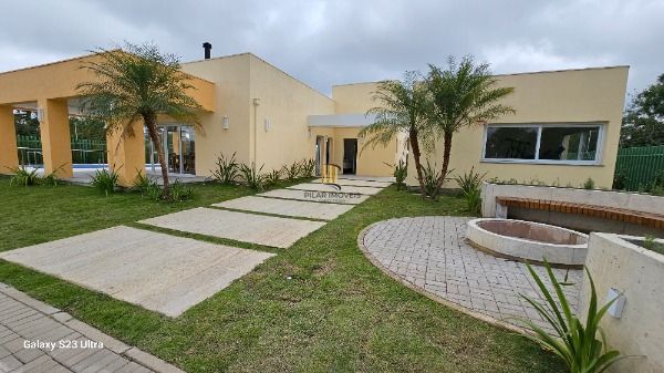 Casa Condominio em Porto Alegre, no bairro Hípica, com 3 dormitório(s), e 3 banheiros, à venda.