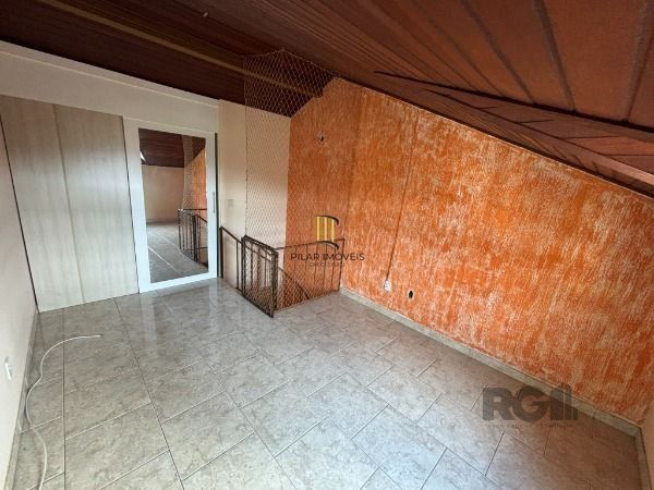 Casa Condominio em Porto Alegre, no bairro Vila Nova, com 3 dormitório(s), à venda.