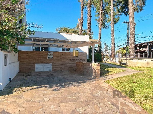 Casa Condominio em Porto Alegre, no bairro Hípica, com 3 dormitório(s), e 3 banheiros, à venda.