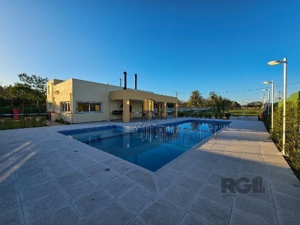 Casa Condominio em Porto Alegre, no bairro Hípica, com 3 dormitório(s), e 3 banheiros, à venda.