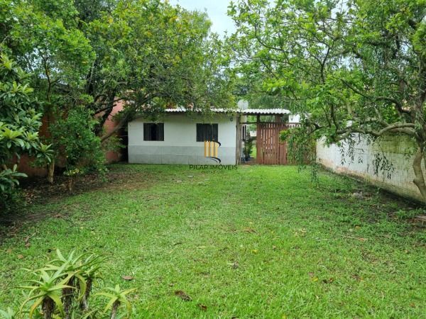 Casa em Porto Alegre, no bairro Guarujá, à venda.