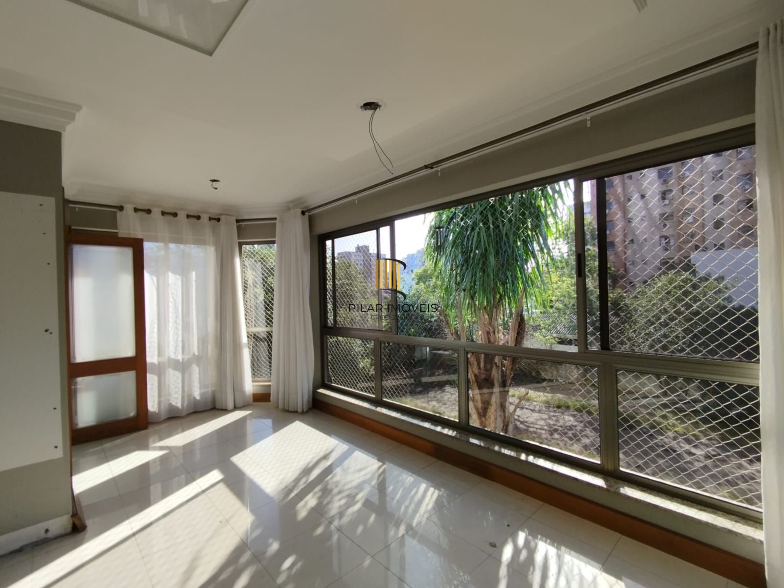 Apartamento com 3 dormitórios á venda no Bairro Tristeza.