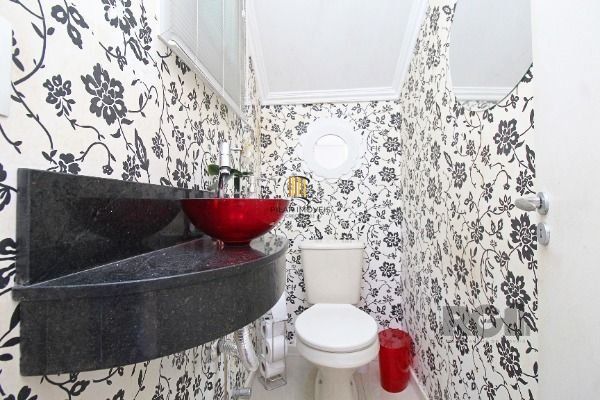 Casa Condominio em Porto Alegre, no bairro Vila Nova, com 3 dormitório(s), e 3 banheiros, à venda.