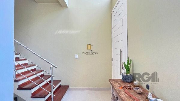 Casa em Porto Alegre, no bairro Hípica, com 3 dormitório(s), e 3 banheiros, à venda.