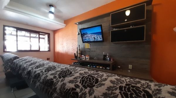 Casa em Porto Alegre, no bairro Hípica, com 3 dormitório(s), à venda.