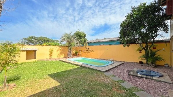 Casa 3 dormitórios no bairro Hípica