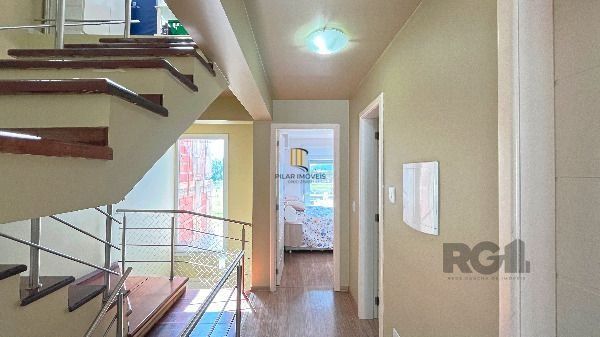 Casa em Porto Alegre, no bairro Hípica, com 3 dormitório(s), e 3 banheiros, à venda.