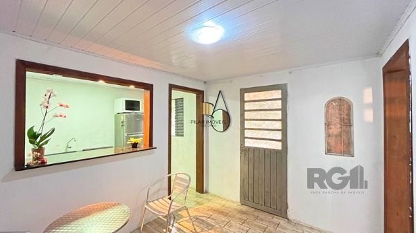 Casa em Porto Alegre, no bairro Cavalhada, com 4 dormitório(s), e 4 banheiros, à venda.