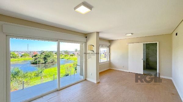 Casa Condominio em Porto Alegre, no bairro Hípica, com 3 dormitório(s), e 3 banheiros, à venda.