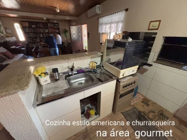 Casa 3 dormitórios no bairro Camaquã