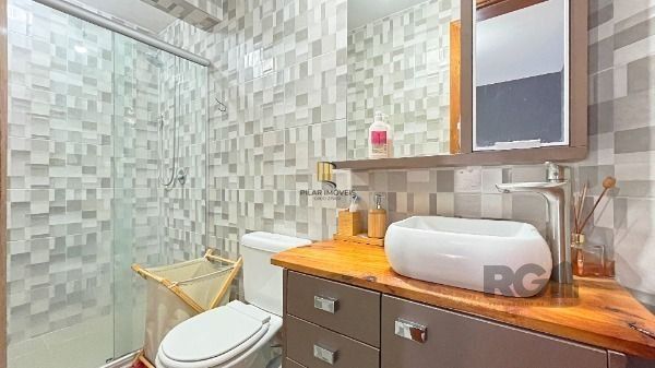 Casa Condominio em Porto Alegre, no bairro Cavalhada, com 3 dormitório(s), e 3 banheiros, à venda.