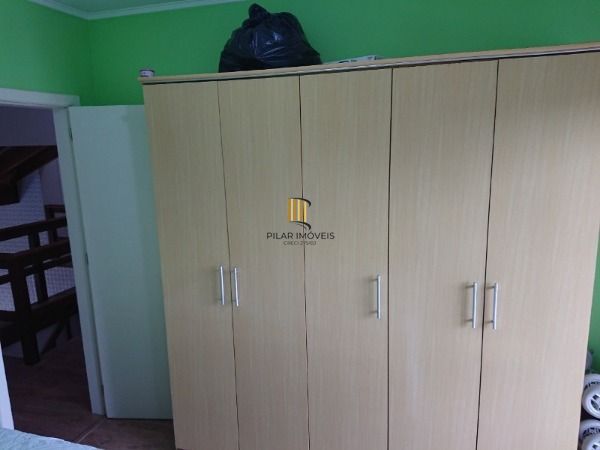 Casa em Porto Alegre, no bairro Espirito Santo, com 4 dormitório(s), e 4 banheiros, à venda.
