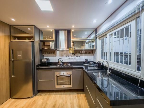 Casa em Porto Alegre, no bairro Vila Conceição, com 3 dormitório(s), e 3 banheiros, à venda.