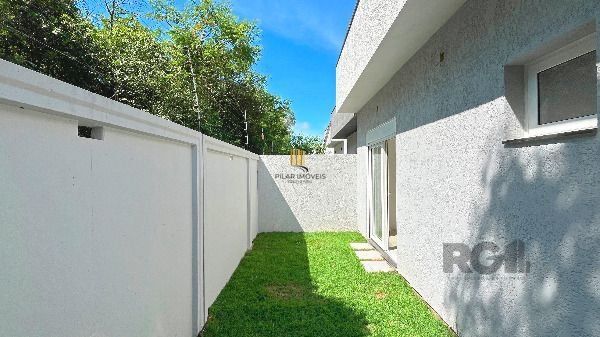 Casa Condominio em Porto Alegre, no bairro Hípica, com 3 dormitório(s), e 3 banheiros, à venda.