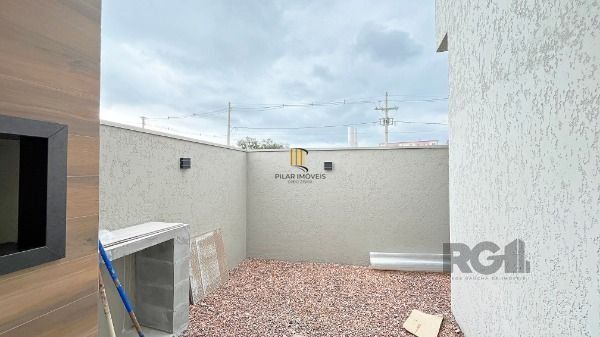 Casa Condominio em Porto Alegre, no bairro Hípica, com 3 dormitório(s), e 3 banheiros, à venda.