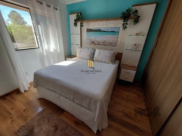 Casa em Porto Alegre, no bairro Hípica, com 3 dormitório(s), e 3 banheiros, à venda.