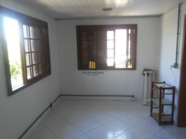 Casa 3 dormitórios no bairro Guarujá
