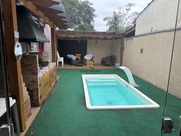 Casa Condominio em Porto Alegre, no bairro Ponta Grossa, com 3 dormitório(s), e 3 banheiros, à venda.
