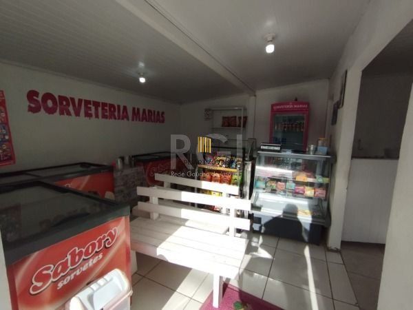 Casa em Porto Alegre, no bairro Belém Novo, com 5 dormitório(s), e 5 banheiros, à venda.