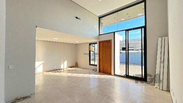 Casa Condominio em Porto Alegre, no bairro Hípica, com 3 dormitório(s), e 3 banheiros, à venda.